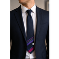 Cranfield University tie worn with a navy suit